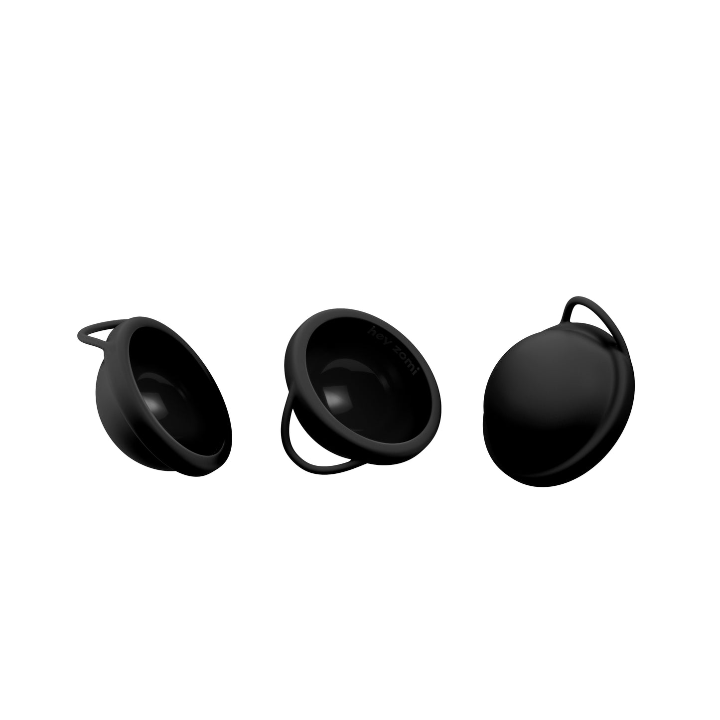 Three black hey zomi menstrual discs on a white background