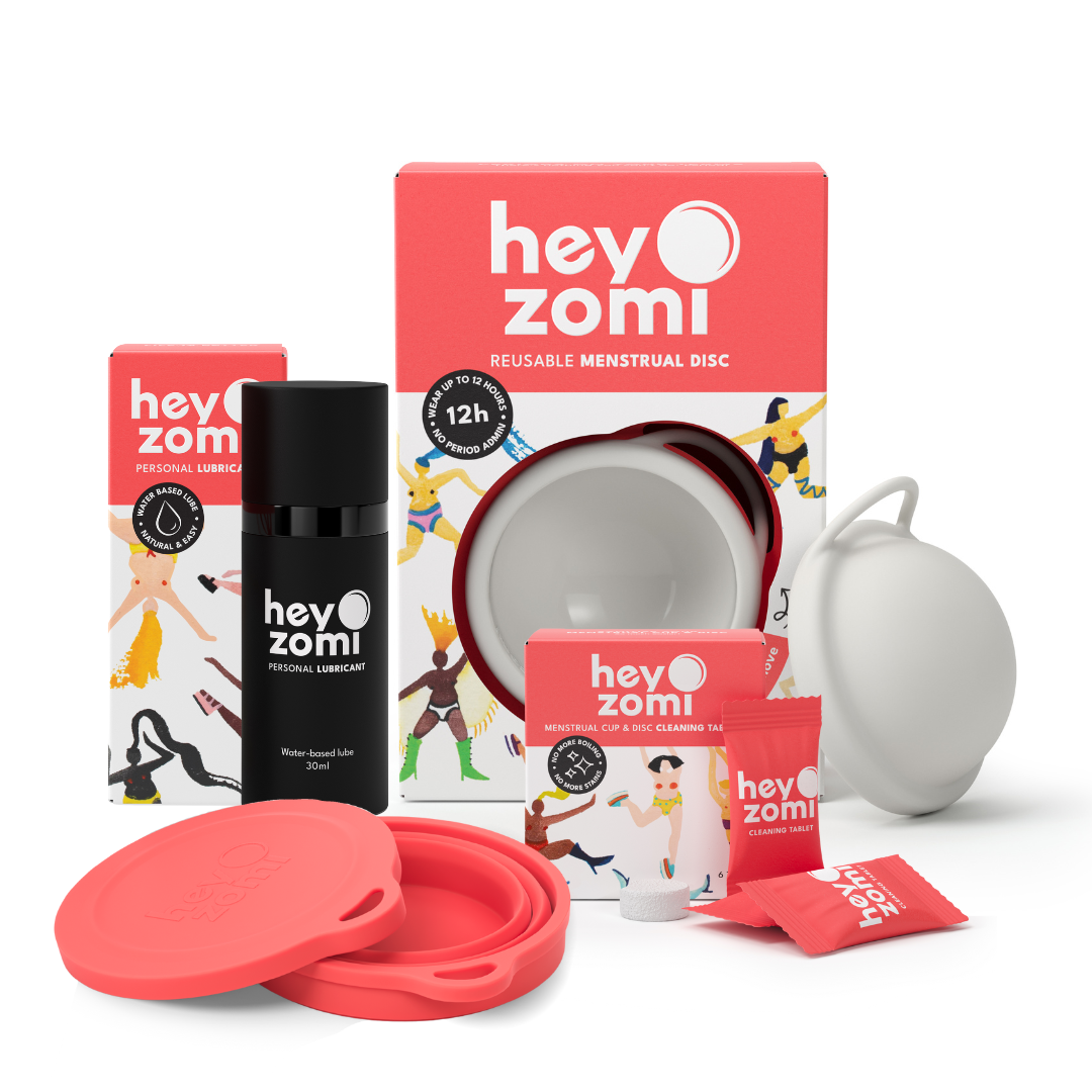 Hey Zomi white menstrual disc bundle called Period Queen Bundle, including menstrual disc, collapsible cleaning and carry cup, water-based lubricant and the hey zomi cleaning tablets that replace boiling and remove stains.